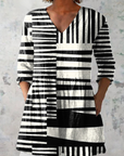 Aurora | Blusa Lunga a Righe Grafiche