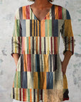 Aurora | Blusa Lunga a Righe Grafiche