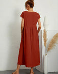 Livia | Abito Maxi Svasato con Tasche