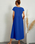 Livia | Abito Maxi Svasato con Tasche